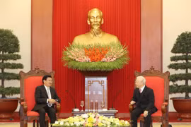 Tổng Bí thư Nguyễn Phú Trọng tiếp Thủ tướng Lào Thongloun Sisoulith, hồi tháng 12/2020. (Ảnh: Trí Dũng/TTXVN)