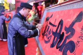 Triển lãm thư pháp tại Trung tâm hoạt động Văn hóa Khoa học Văn Miếu-Quốc Tử Giám. (Ảnh: Thanh Tùng/TTXVN)