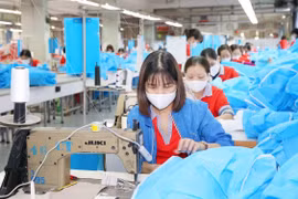 Sợi PFY được sử dụng để dệt các loại vải dùng trong ngành may mặc. (Ảnh: Phương Hoa/TTXVN)