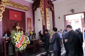 [Photo] Kỷ niệm 130 năm ngày sinh Chủ tịch Hồ Chí Minh tại Trung Lào