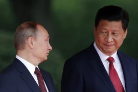 Tổng thống Nga Vladimir Putin và Chủ tịch Trung Quốc Tập Cận Bình. (Nguồn: AFP)