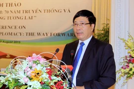 Phó Thủ tướng, Bộ trưởng Ngoại giao Phạm Bình Minh phát biểu tại hội thảo. (Ảnh: TTXVN),