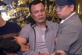 Đối tượng Nguyễn Văn Cường tại cơ quan điều tra. (Ảnh: TTXVN phát)