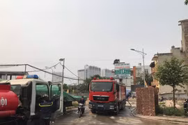 Vụ cháy làm 8 người chết và mất tích. (Ảnh: TTXVN)