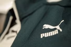 Hai hãng thời trang Puma và Prada tạm dừng hoạt động bán lẻ tại Nga