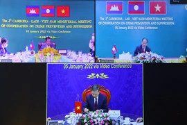 Đại tướng Tô Lâm, Bộ trưởng Bộ Công an ký kết Tuyên bố chung về hợp tác phòng, chống tội phạm giữa Việt Nam-Lào-Campuchia. (Ảnh: Văn Điệp/TTXVN)