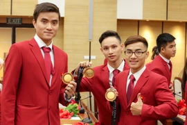 134 huấn luyện viên, vận động viên thể thao Hà Nội đạt thành tích cao tại SEA Games đã được thành phố Hà Nội chúc mừng và biểu dương trong số đó không ít những anh chàng điển trai. (Ảnh: Minh Sơn/Vietnam+) 
