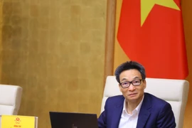 Phó Thủ tướng Vũ Đức Đam phát biểu chỉ đạo tại phiên họp thường kỳ Ủy ban Quốc gia về trẻ em năm 2022. (Ảnh: Văn Điệp/TTXVN)