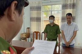 Đỗ Minh Trọng nghe đọc bắt tạm giam. (Ảnh: TTXVN phát)