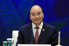 Chủ tịch nước Nguyễn Xuân Phúc dự Phiên họp hẹp lần thứ nhất - Tuần lễ Cấp cao APEC lần thứ 29. (Ảnh: Thống Nhất/TTXVN)