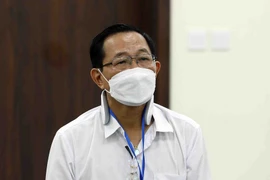 Bị cáo Cao Minh Quang (sinh năm 1956, cựu Thứ trưởng Bộ Y tế) tại phiên xét xử sơ thẩm. (Ảnh: Phạm Kiên/TTXVN)