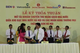 Đại diện BIDV và KBNN Hà Nội ký thỏa thuận mở tài khỏan thu NSNN trên địa bàn Hà Nội. (Nguồn: BIDV)