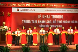 Lễ cắt băng khai trương Trung tâm Chăm sóc khách hàng. (Nguồn: Agribank)