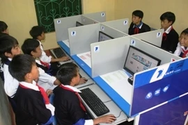 Học sinh vùng khó sẽ có cơ hội tiếp cận Internet từ những dự án nhân đạo. (Ảnh minh họa. PV/Vietnam+)