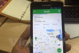Ứng dụng gọi xe công nghệ của Grab. (Nguồn ảnh: Vietnam+)