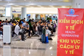 Khu vực khách chờ làm thủ tục nhập cảnh tại sân bay Nội Bài. (Ảnh: Phan Công/Vietnam+)