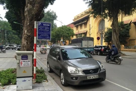 Một điểm trông giữ xe dưới lòng đường qua hệ thống ứng dụng iParking. (Ảnh: Việt Hùng/Vietnam+)