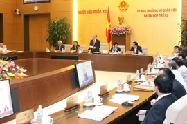 Chủ tịch Quốc hội Nguyễn Sinh Hùng phát biểu khai mạc Phiên họp thứ 42 của Ủy ban Thường vụ Quốc hội. (Ảnh: Nhan Sáng/TTXVN)