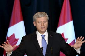 Thủ tướng Canada Stephen Harper trong cuộc họp báo về Hiệp định TPP tại Ottawa, ngày 5/10.(Nguồn: Reuters/TTXVN)