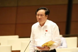 Viện trưởng Viện Kiểm sát Nhân dân tối cao Nguyễn Hòa Bình báo cáo bổ sung làm rõ ý kiến của đại biểu Quốc hội. (Ảnh: Phương Hoa/TTXVN)