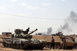 Binh sỹ Iraq trong chiến dịch giành lại quyền kiểm soát nhà máy lọc dầu Baiji. (Nguồn: AFP/TTXVN)