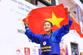 Vận động viên đội tuyển Vovinam Việt Nam Đỗ Phương Thảo giành huy chương Vàng ở nội dung đối kháng hạng cân 65kg nữ. (Ảnh: Tuấn Anh/TTXVN)