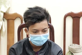 Tại cơ quan Công an, đối tượng Quách Thành Luân khai nhận hành vi giết người cướp tài sản của mình. (Ảnh: TTXVN phát)
