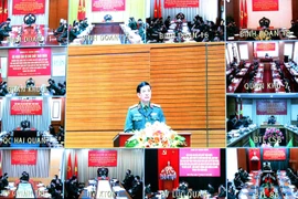 Các điểm cầu trong toàn quân dự hội nghị. (Ảnh: Trọng Đức/ TTXVN) 