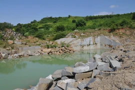 Hiện trường vụ khai thác đá không phép của công ty Tú Mai. (Ảnh: TTXVN phát)