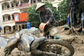 Hình ảnh tỉnh Nghệ An nỗ lực khắc phục hậu quả lũ quét ở Kỳ Sơn