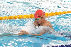 Vận động viên Võ Thị Mỹ Tiên (Việt Nam) thi đấu vòng loại bơi 200m hỗn hợp nữ. (Ảnh: Phạm Kiên/TTXVN)