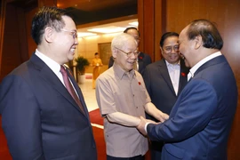 Tổng Bí thư Nguyễn Phú Trọng, Chủ tịch nước Nguyễn Xuân Phúc, Thủ tướng Phạm Minh Chính, Chủ tịch Quốc hội Vương Đình Huệ dự phiên họp. (Ảnh: TTXVN)