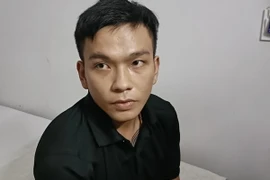 Đối tượng Lưu Đức Anh bị bắt giữ. (Ảnh: TTXVN phát)