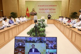 Thủ tướng Phạm Minh Chính, Chủ tịch Ủy ban chủ trì phiên họp thứ hai của Ủy ban Quốc gia về chuyển đổi số nhằm đánh giá tình hình triển khai công tác chuyển đổi số quý I. (Ảnh: Lâm Khánh/TTXVN) 