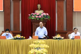 Chủ tịch nước Nguyễn Xuân Phúc làm việc với lãnh đạo chủ chốt tỉnh Tiền Giang. (Ảnh: Thống Nhất/TTXVN)