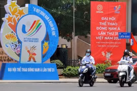 Ngã tư Liễu Giai với cụm mô hình và pano tuyên truyền SEA Games 31. (Ảnh: Tuấn Đức/TTXVN)