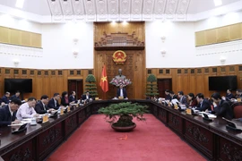 Thủ tướng Phạm Minh chính chủ trì họp Thường trực Chính phủ về chính sách tài khoá, tiền tệ. Ảnh: Dương Giang-TTXVN 