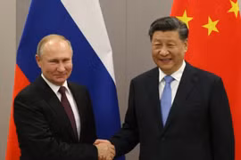 Tổng thống Nga Vladimir Putin và Tổng Bí thư Đảng Cộng sản Trung Quốc Tập Cận Bình. (Nguồn: eturbonews.com) 