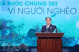 Thủ tướng Phạm Minh Chính phát biểu, vận động ủng hộ giúp đỡ người nghèo nhân Tháng cao điểm Vì người nghèo năm 2022. (Ảnh: Dương Giang/TTXVN)
