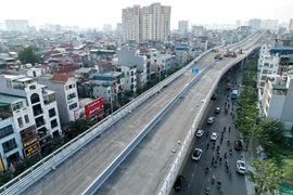 Khi dự án hoàn thành và đi vào vận hành sẽ giúp thay đổi bộ mặt tuyến Vành đai 2 tại khu vực này, giảm ùn tắc giao thông cho đường Trường Chinh, Đại La, Minh Khai... góp phần hoàn thiện quy hoạch giao thông của Hà Nội. (Ảnh: Tuấn Anh/TTXVN) 