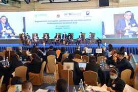 Các đại biểu lắng nghe ý kiến phát biểu của Thiếu tướng Nguyễn Văn Long, Thứ trưởng Bộ Công an. (Ảnh: Huy Tiến/TTXVN)