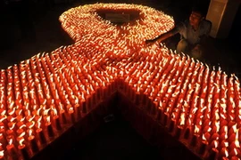 Có thể trong vài năm tới, thế giới sẽ có vắcxin HIV/AIDS. (Nguồn: AFP/TTXVN)