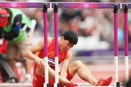 Liu Xiang chia tay sớm Olympic London. (Nguồn: Getty)