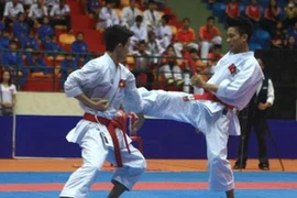 Các vận động viên thi đấu. )Ảnh: Duy Khương/TTXVN)