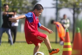 [Photo] Tưng bừng ngày hội bóng đá trẻ ở Bình Dương