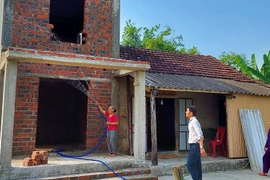 Nhà vượt lũ của một hộ dân ở xã Tân Thủy, huyện Lệ Thủy, tỉnh Quảng Bình. (Nguồn: Bộ Xây dựng)