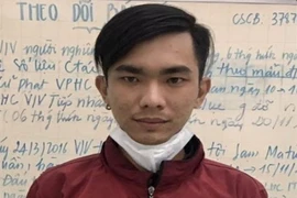 Đối tượng Nguyễn Thanh Huy tại cơ quan công an. (Ảnh: TTXVN phát)