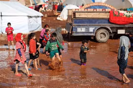 Trẻ em tại một trại tị nạn ở Syria. (Ảnh: AFP/TTXVN)