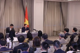 Thủ tướng Phạm Minh Chính phát biểu tại buổi gặp trí thức Việt kiều và thanh niên, sinh viên Việt Nam tại New York. (Ảnh: Dương Giang/TTXVN)