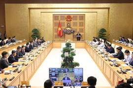 Quang cảnh buổi làm việc. (Ảnh: Dương Giang/TTXVN)